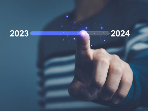 istock Businessman touching to change from 2023 to 2024 1878762961