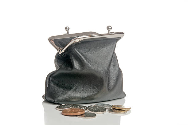 istock Black purse and coins on white background 187879371