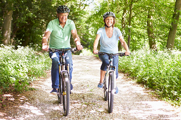 istock Senior Couple On Cycle Ride In Countryside 187879679