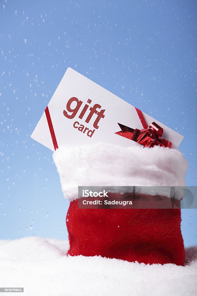 Geschenkgutschein in Santa's sack - Lizenzfrei Band Stock-Foto