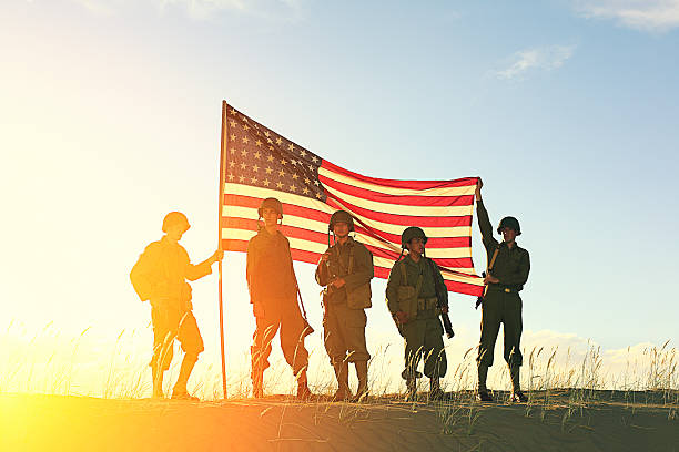 istock World War 2 Soldiers with American Flag 187879863