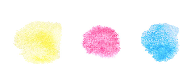 Spot watercolor of yellow, magenta and cyan color texture isolated on white background