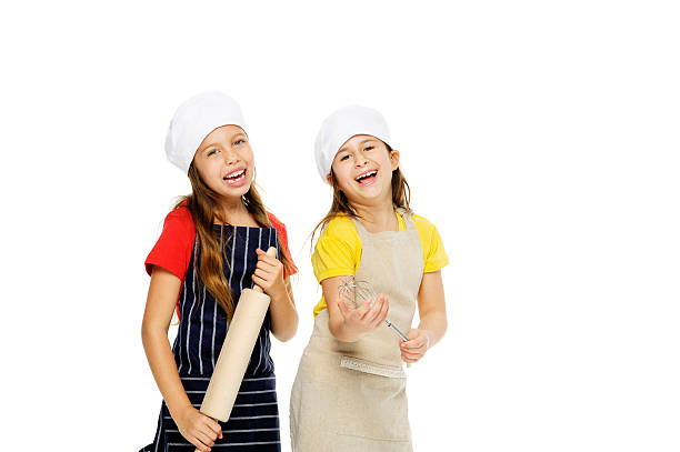 child chef girl cooks friends playing kitchen together having fun isolated on white background.