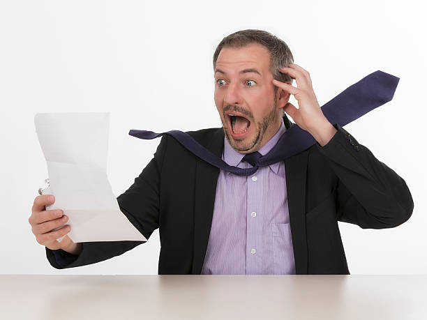 istock Businessman is horrified by a unbelievable bill  III 187890540