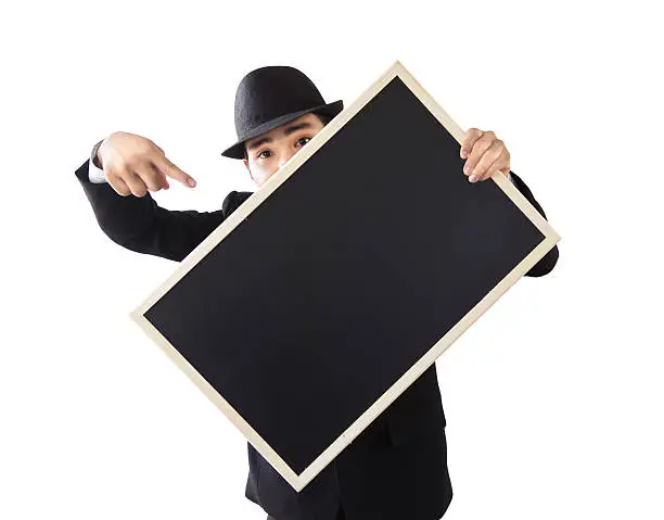 Businessman holding a blackboard in hands.