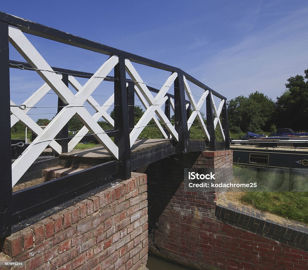 canal a canal on the inland waterways network of navigable canals and waterways in the english and british countryside in the uk, united kingdom, great britain, europe Bridge - Built Structure Stock Photo