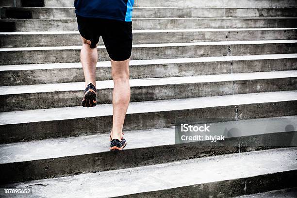 Man Running On Stairs Sports Training Stock Photo - Download Image Now - Achievement, Active Lifestyle, Activity