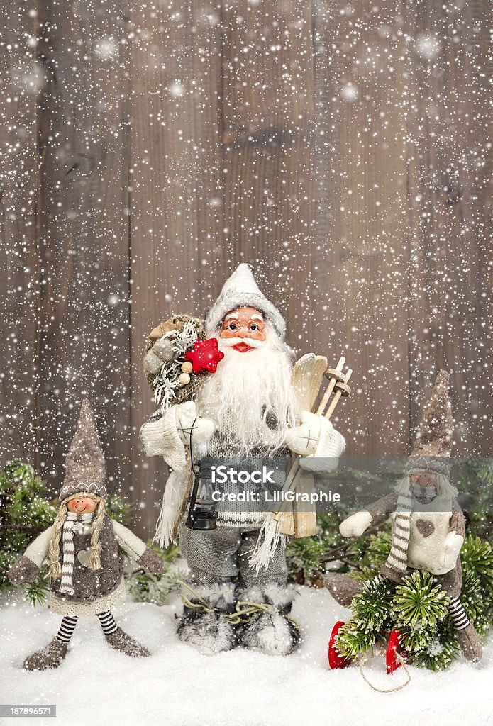 Cute Santa Claus and happy kids in snow Cute Santa Claus and happy kids in snow. Christmas decoration. Vintage style picture with falling snow effect Child Stock Photo