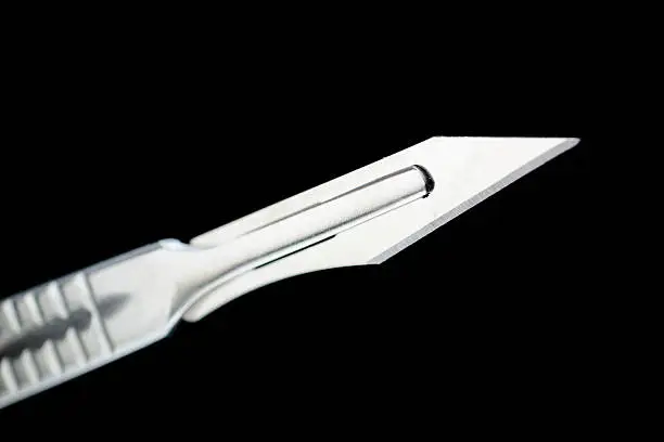 Scalpel isolated on black, file inclues a clipping path.