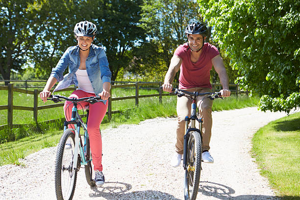 istock Young Couple On Cycle Ride In Countryside 187899684