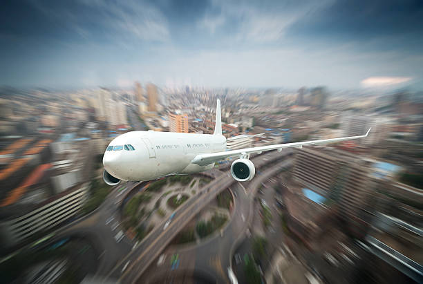 istock airplane away from the city 187899986