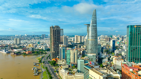 Ho Chi Minh city, Vietnam - September 27th, 2023: Aerial view of a Ho Chi Minh city with development buildings, transportation, energy infrastructure. Financial and business centers in Vietnam.