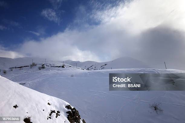 Offpiste Slope And Mountains In Haze Stock Photo - Download Image Now - Back Country Skiing, Caucasus, Caucasus Mountains