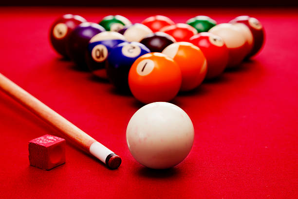 istock Billards pool game. Cue ball, color balls in triangle, chalk 187903859