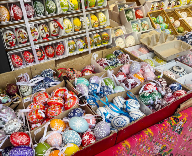 istock Side view of Easter stalls with decorative eggs of various colors and sizes 1879072527