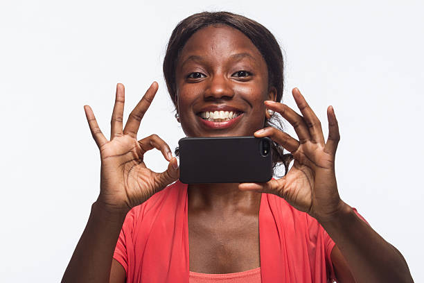 istock Woman taking picture with smartphone, horizontal 187907404