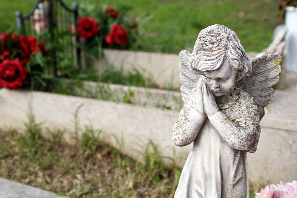 Marble Angel in cemetery stock photo