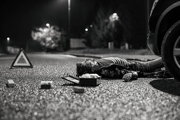 istock Car accident with dead pedestrian lying on the street 187916889