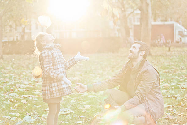 istock Father and daughter having fun in a London`s park 187917240