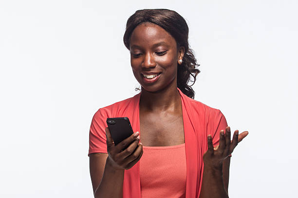 istock Woman reading text on her phone, horizontal 187920673