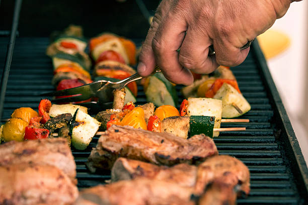 istock cooking BBQ atGrill and hand 187921175