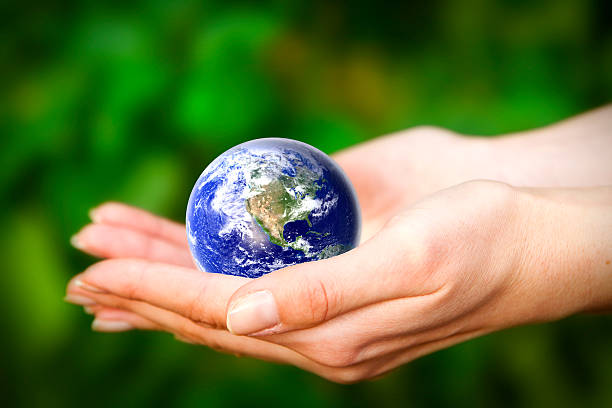 istock Earth in hands. Glass World 187923487