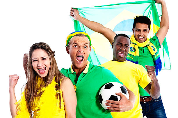 istock Four Brazilian soccer supporters cheering their team on! 187924475