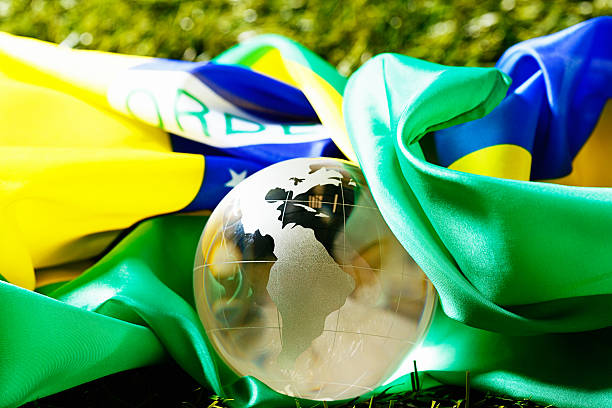 istock Glass world globe with Brazilian flag 187924968