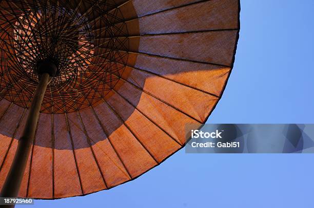 Decoration Umbrella Blue Sky Red Body Stock Photo - Download Image Now - Arid Climate, Backwater, Blue Background