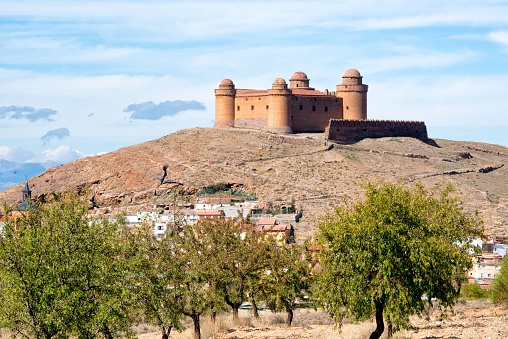 La Calahorra, Spain, october 19th 2019: village of the Calahorra with its castle in the mountain. Photo taken from the public road to village
