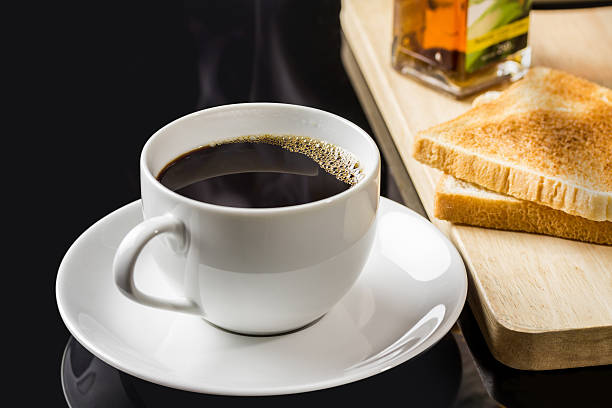 istock Cup of coffee and breads 187935703