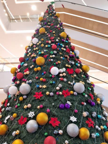 istock A large, eye-catching Christmas tree is displayed in the mall. 1879357994