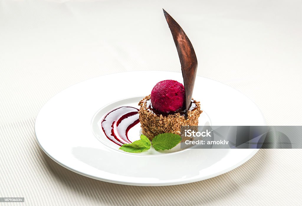 Dessert Delicious chocolate dessert with cherry ice-cream on a plate Gourmet Stock Photo