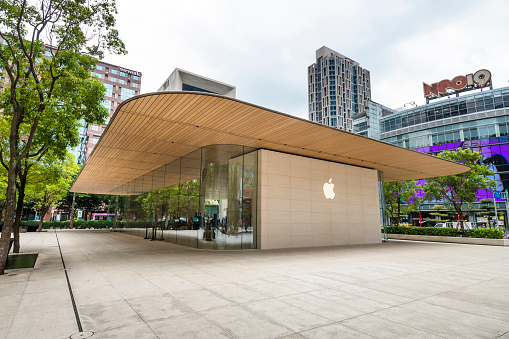 Chicago, USA - Aug 6, 2018: The new Apple store on Michigan Avenue along the river late in the day as customers shop.