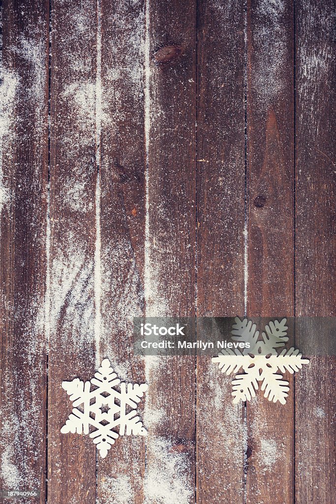 snowflake ornaments Snowflake ornaments on wood. Christmas Stock Photo