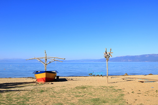 view of Lake Ohrid with fisherman boats near Pogradec in Albania