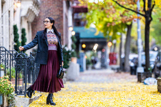 Elegantly dressed female New Yorker seen on an autumn day