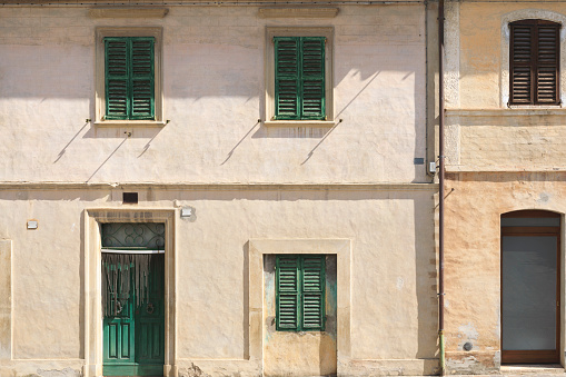 Old house in sunny day, detail of the facade