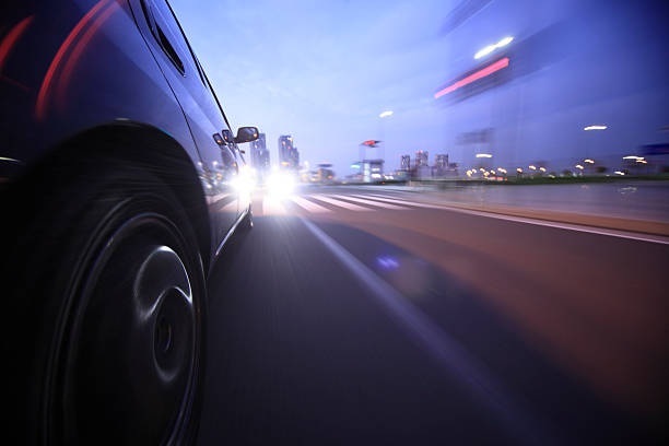 istock Driving in the sunset city. 187945332