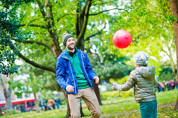 istock Father and daughter having fun in a London`s park 187952455