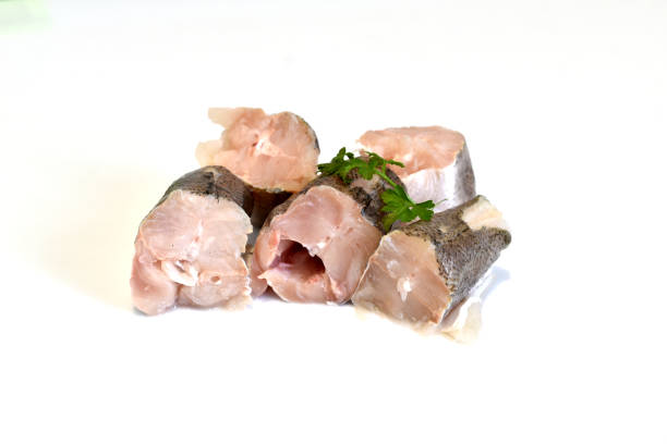 istock Pieces of hake fish on a white background. 1879528176