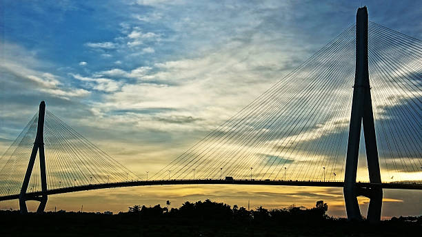istock Silhouette of the Can To Bridge at sunset 187956267
