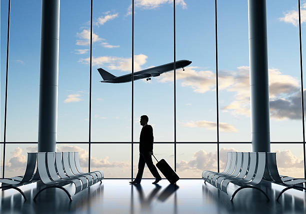 istock Businessman traveling alone at empty airport 187958378