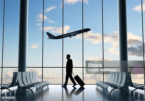Businessman Traveling Alone At Empty Airport Stock Photo - Download Image Now - Adult, Air Vehicle, Airplane