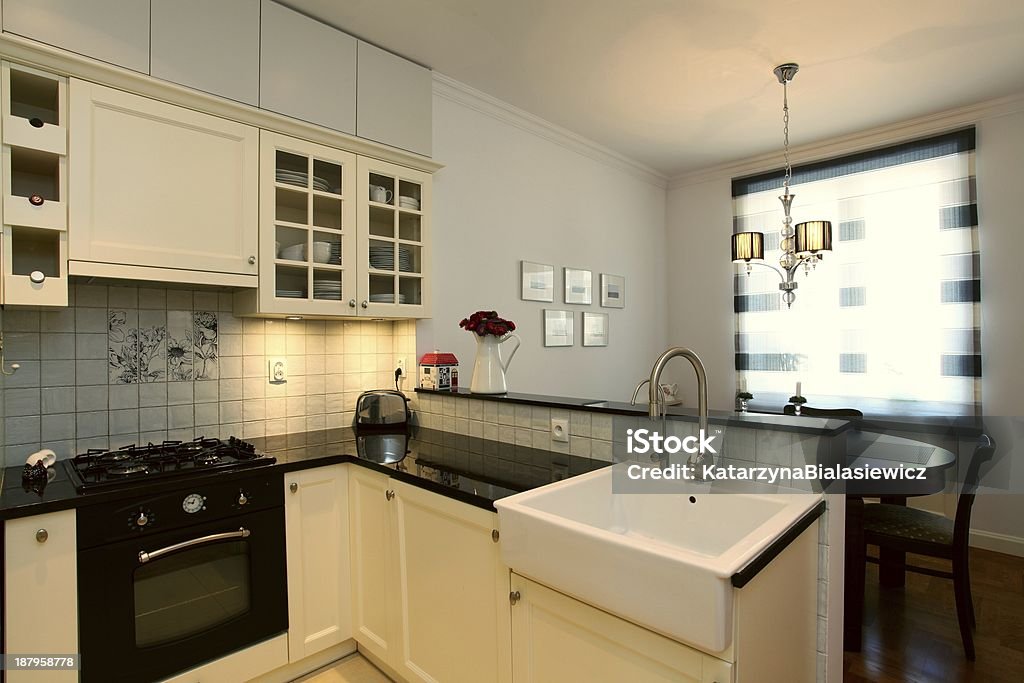 New stylish kitchen New stylish kitchen with small dining room Farmhouse Stock Photo