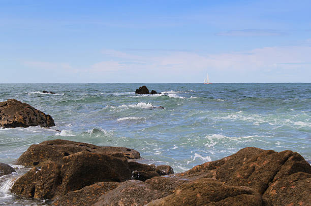 istock beautiful stones in the waves on ocean coast 187961282