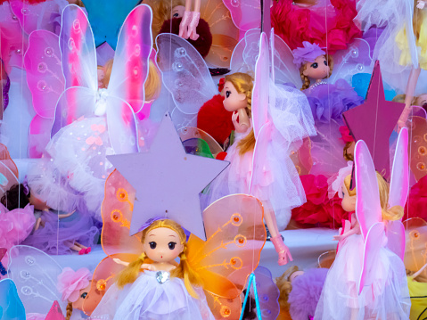 Small colorful dolls for girls at a traditional street market