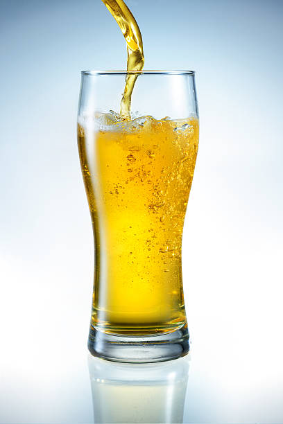 istock Beer is pouring into the glass 187961963