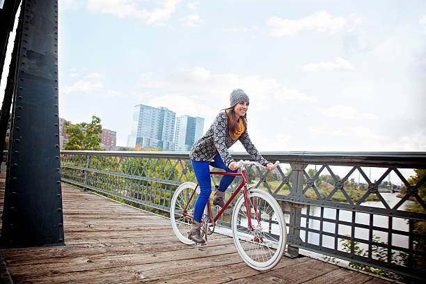 istock Young Woman with Urban Bicycle 187963339