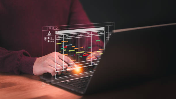 istock Employee working with computer in business analytic and data management system to make report with KPI and metric connect to database. Corporate strategy for operations, planning, marketing, HR 1879686491